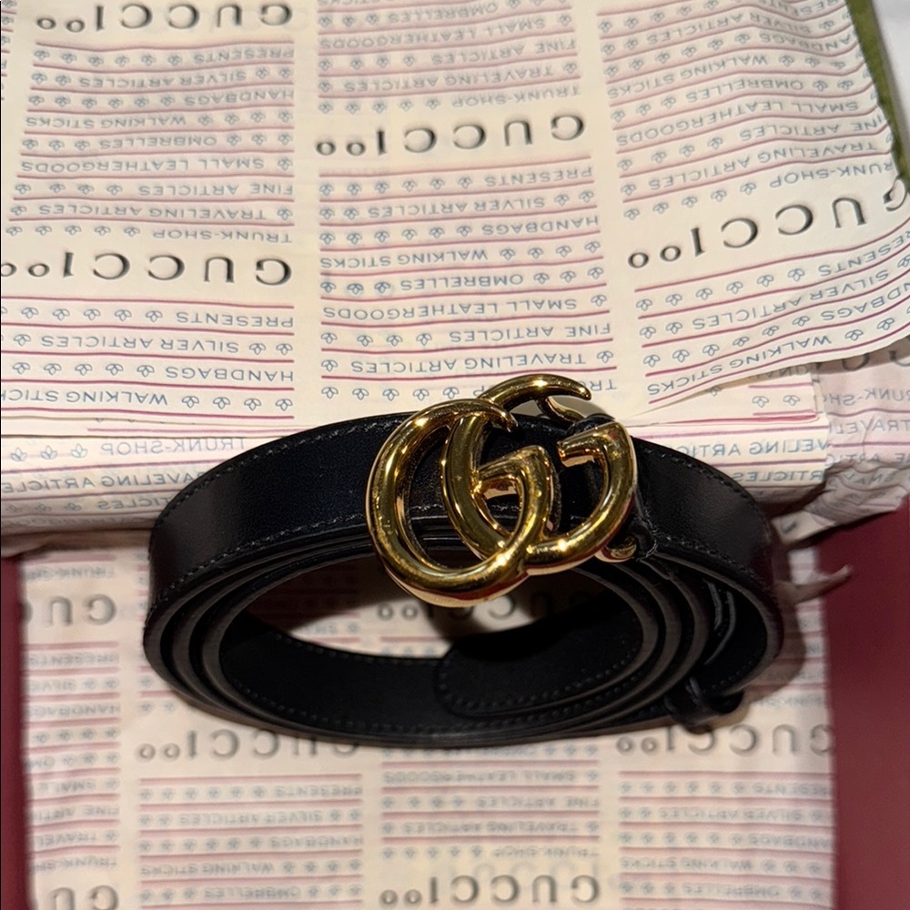 Gucci Black and Gold Leather Belt with Iconic GG Buckle